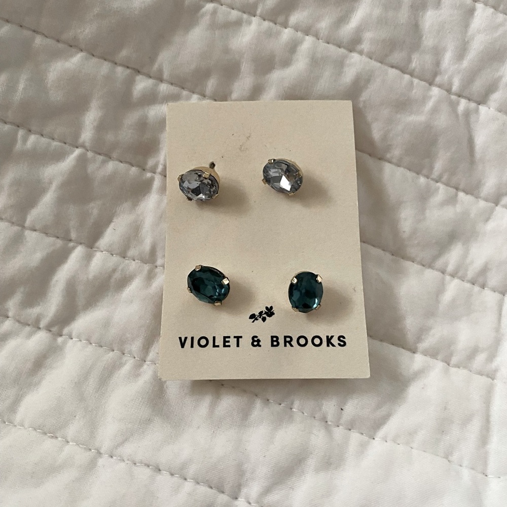 “Diamond” and “Emerald” stud earrings.